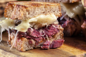 Reuben Sandwich with corned beef, cheese and sauerkraut.