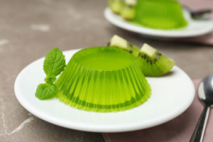 Plate with kiwi jello and mint