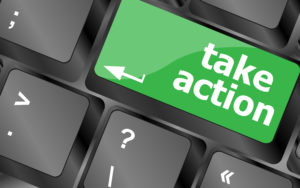 Take action key on a computer keyboard, business concept