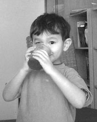 Child drinking homemade soda